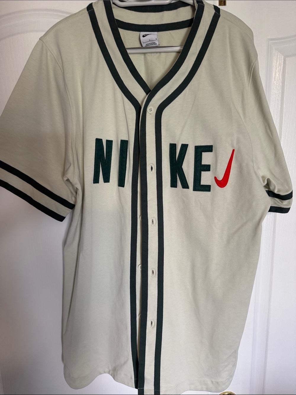 Nike SB Men’s Cream Baseball Jersey with Dark Green Trim and Red Swoosh